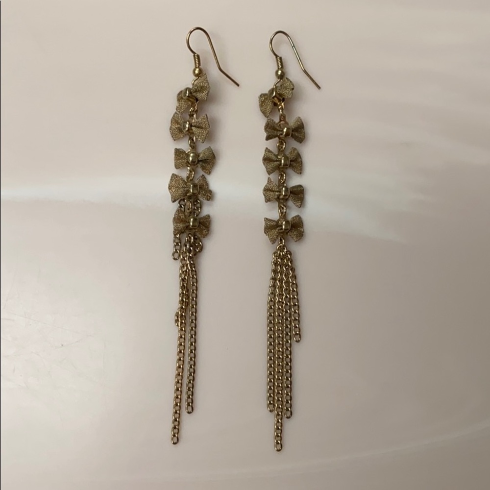 Gold bow earrings‎
